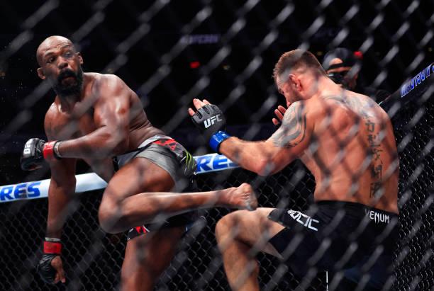 Jon Jones successfully defends his UFC heavyweight title against Stipe Miocic at UFC 309, breaking financial records with a massive gate sale of 16,673,954 dollars.