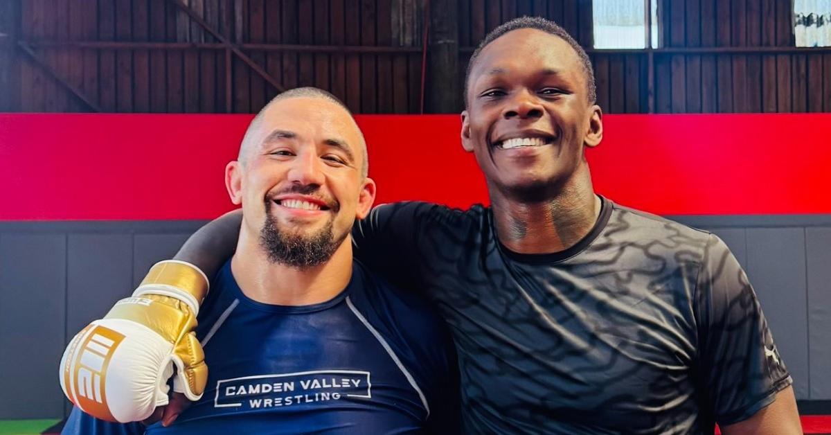 Israel Adesanya and Robert Whittaker put aside their rivalry to train together, boosting their skills and friendship in the UFC.