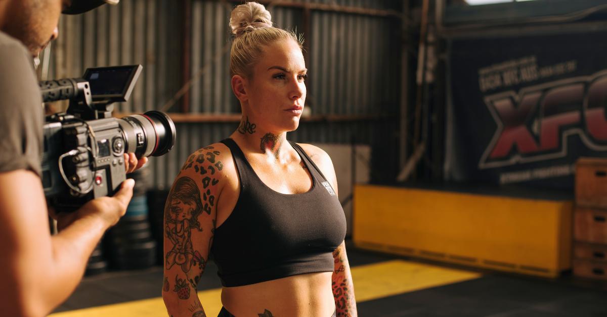 Bec Rawlings' journey from MMA to advocating against domestic violence, highlighting her personal struggles and the importance of awareness.