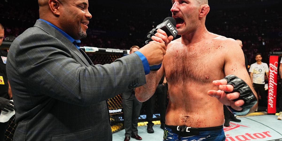 Sean Strickland's UFC 312 loss to Dricus du Plessis sparks career doubts and coach criticism.